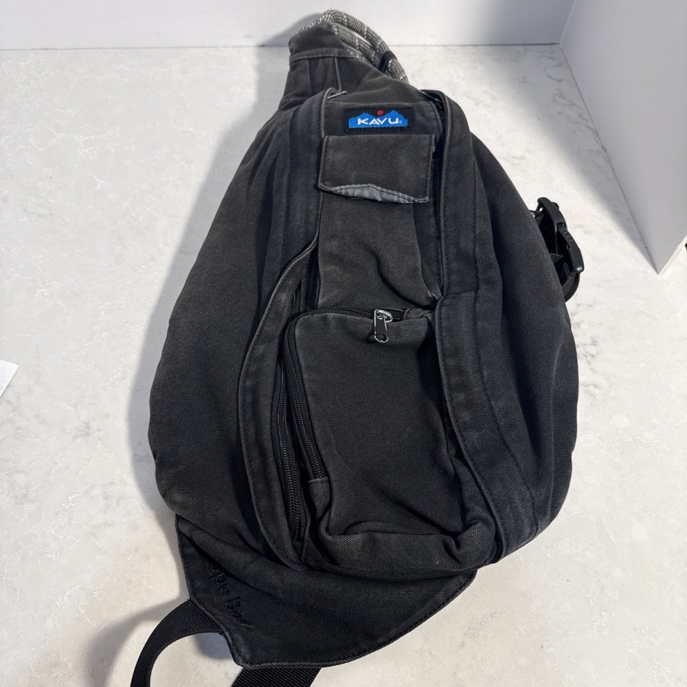 KAVU Rope Sling Bag Crossbody Backpack Black Embroidered Logo Adjustable Strap